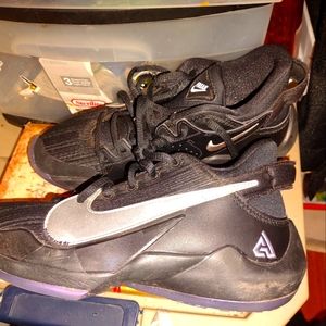 Kids black and purple Nikes.dont fit my kid anymore .